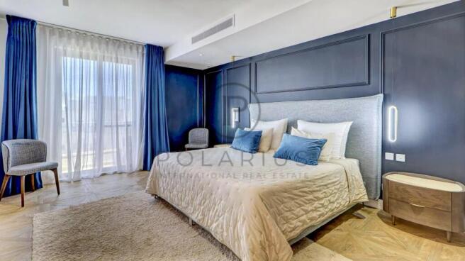 Modern bedroom with a comfortable bed, stylish blu