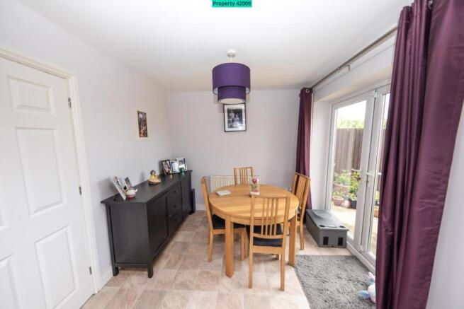 Dining area with patio doors to garden