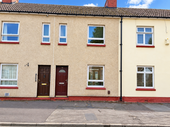 Terraced Houses Under a Blue Sky.png