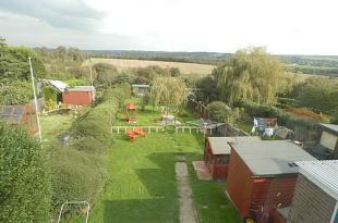 Rear garden f above
