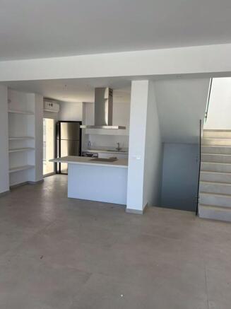 Kitchen & Stairs to