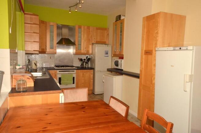 Bright and functional kitchen featuring ample w...