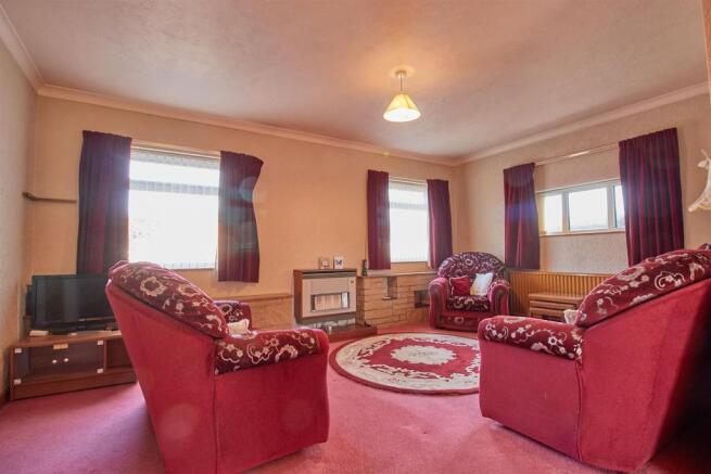 THROUGH LOUNGE-DINNING ROOM TO FRONT