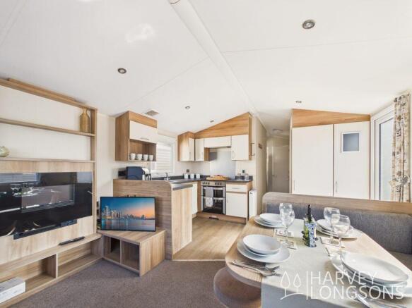 Open-plan lounge, dining area and kitchen in the W