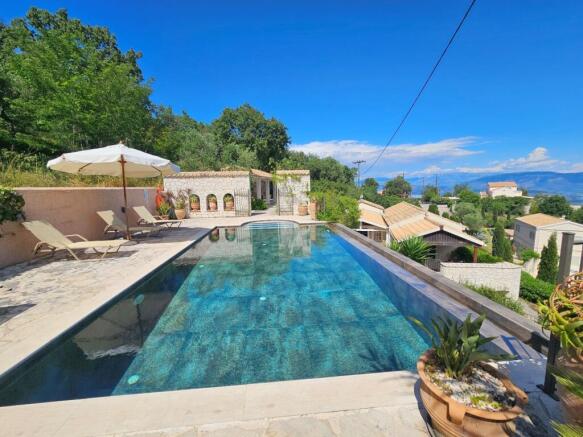 Pool terrace and house below