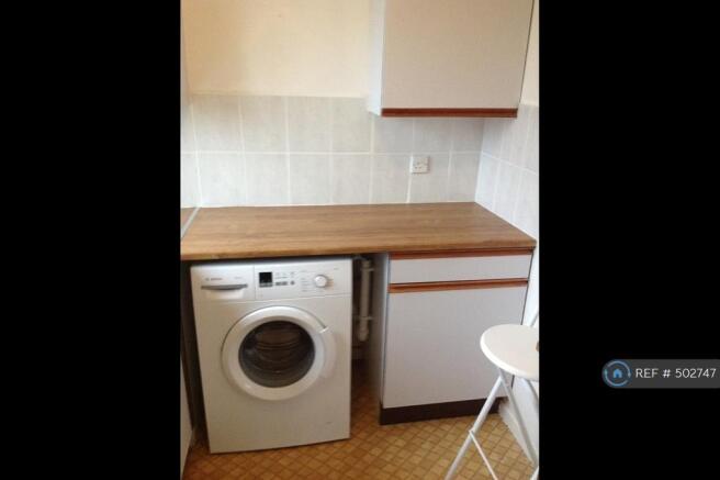 Kitchen Showing Washing Machine