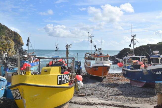 Nearby boats on beach 1.JPG