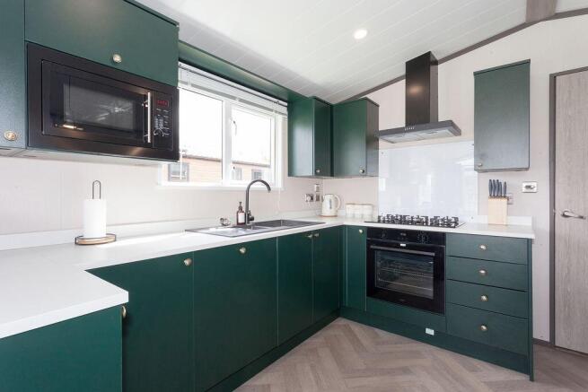 Photo 2 - Kitchen Area