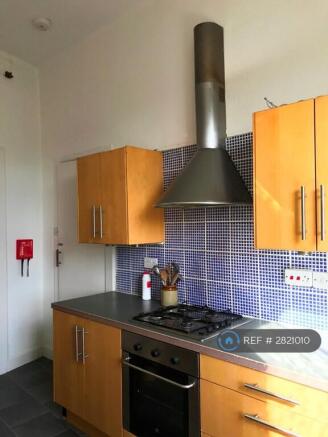 Stylish Kitchen With Dining Table & Lounge Area