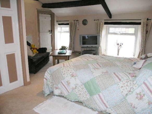 BEDROOM ONE 2ND FL