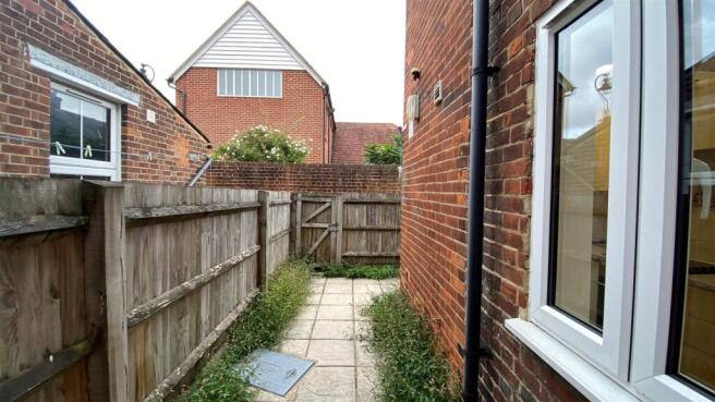 Private paved outdoor space with secure gate...