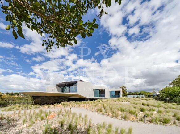 Modern architectural villa in Carvoeiro Algarve set within landscaped natural surroundings