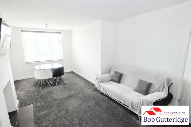 THROUGH LOUNGE / DINING ROOM
