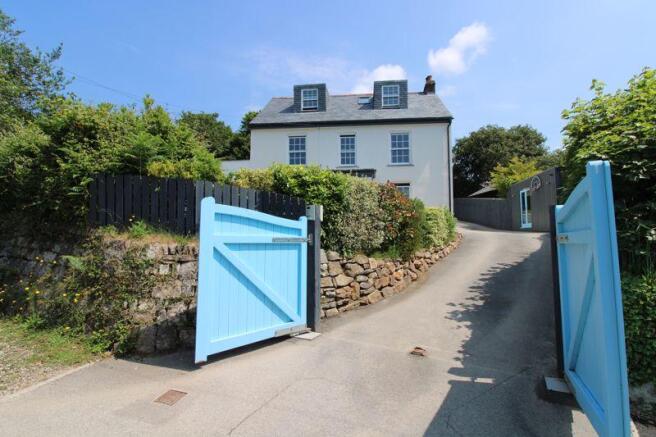 Electric gated entrance and driveway