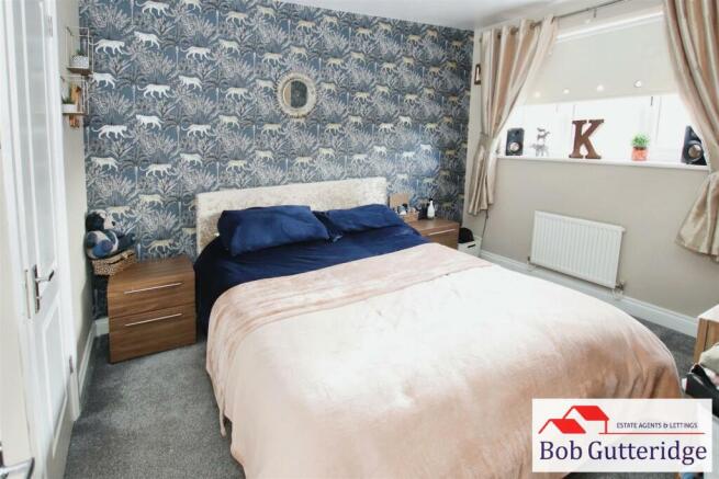 BEDROOM ONE (FRONT)