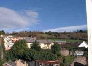 Views over village to countryside
