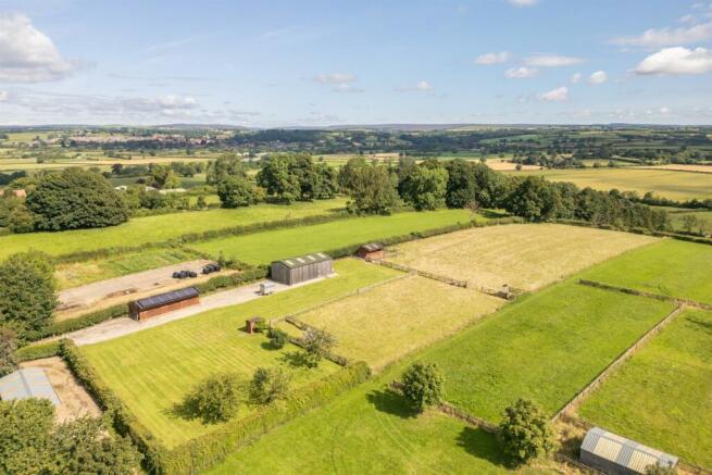 Aerial View of Land, Stables & Barn