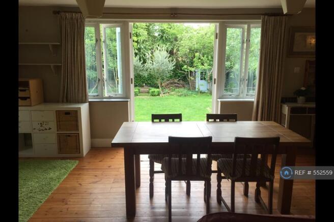 Dining Room And French Doors Onto Garden