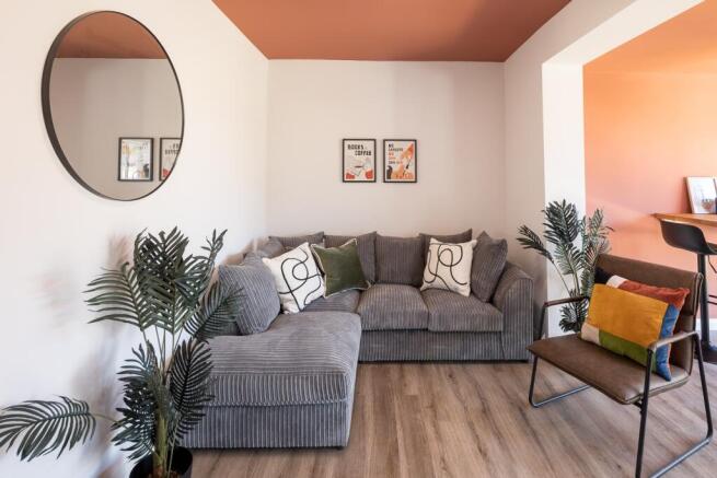 Stylish lounge with plush sofa and modern decor...