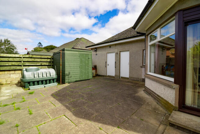 Rear Patio Area & Access into Garage