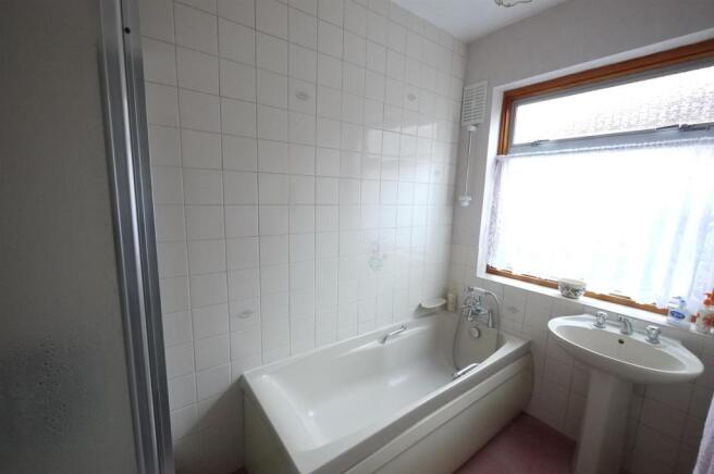 Part Tiled Bathroom:-