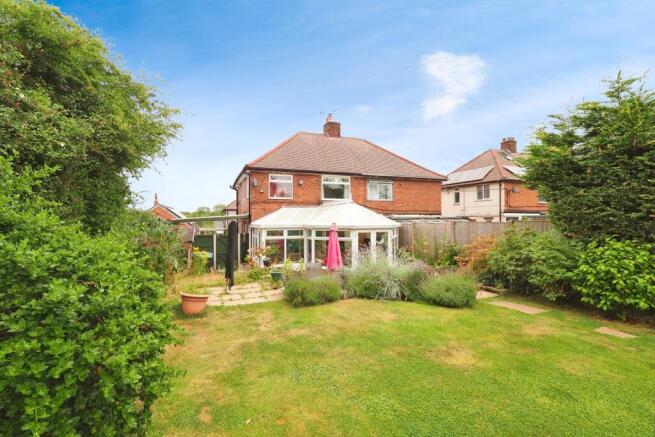 Pretty rear garden with plenty of space for entertaining or relaxing