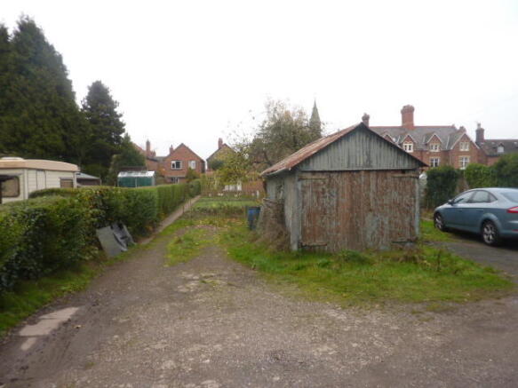 Parking Area & Access To The Rear