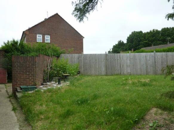 AREA OF FRONT CORNER GARDEN