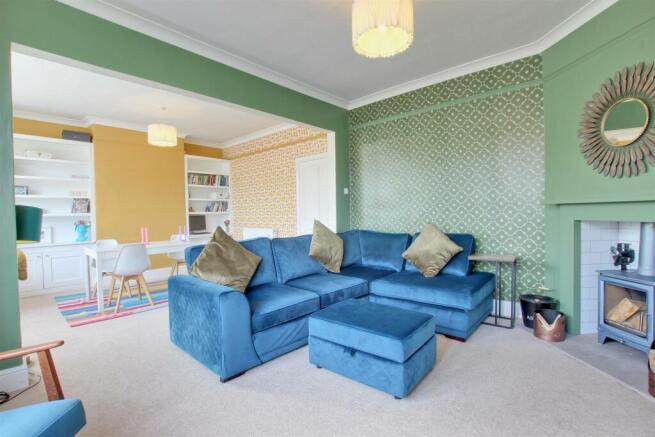 THROUGH LOUNGE AND DINING ROOM