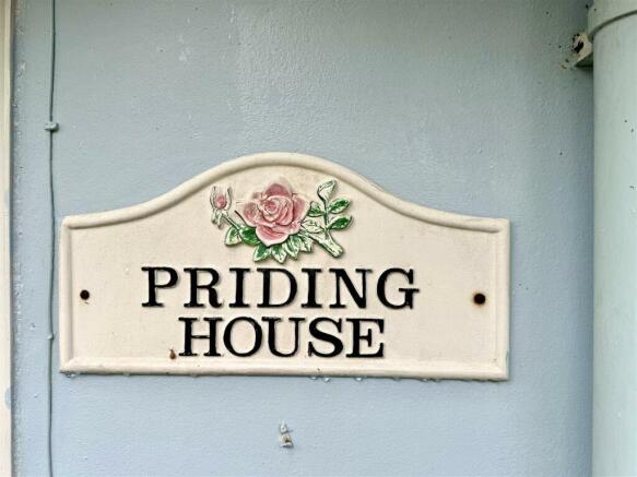 PRIDING HOUSE