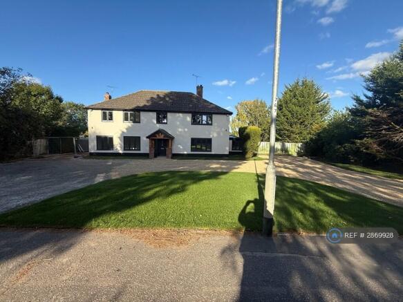Front Elevation And Driveway
