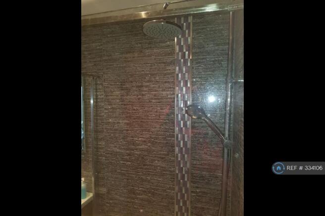 2 Way Power Shower With Glass Cubicle.