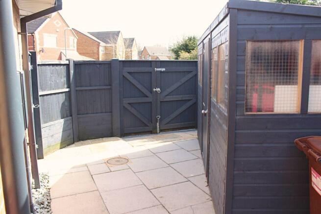 Enclosed Paved Side