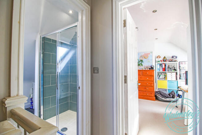 Shower & access to bedroom five