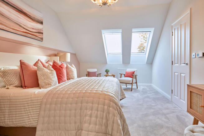 En suite main bedroom in the Woodcote 4 bedroom home