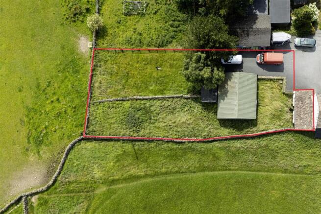 Aerial with outline of proposed building plot.jpg