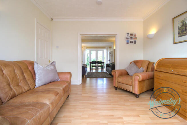 Sitting dining room with French doors between_