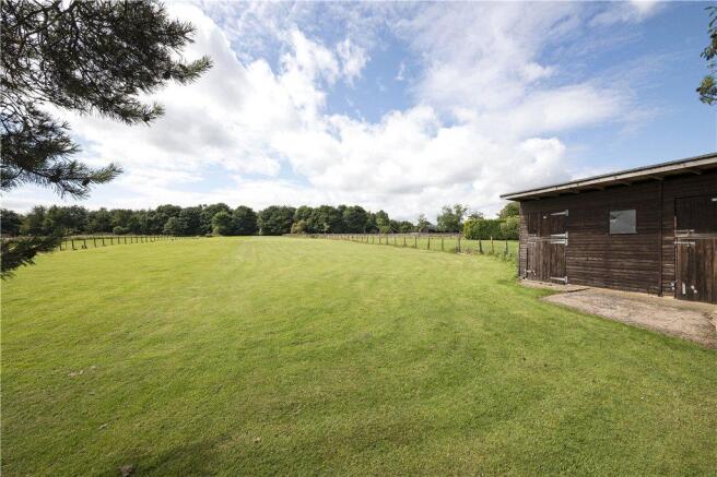 Paddock With Stables