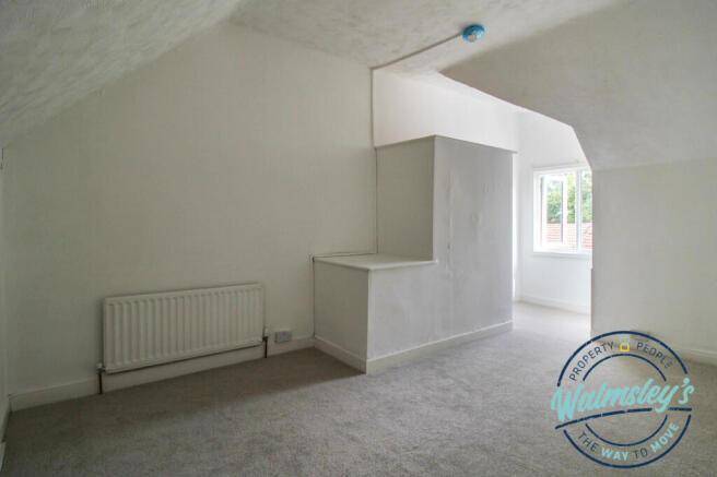 Top floor bedroom with dormer