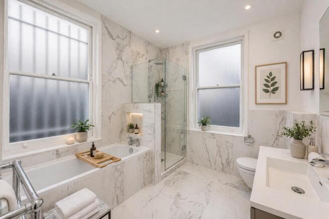 master bathroom with marble effect tiling shower a