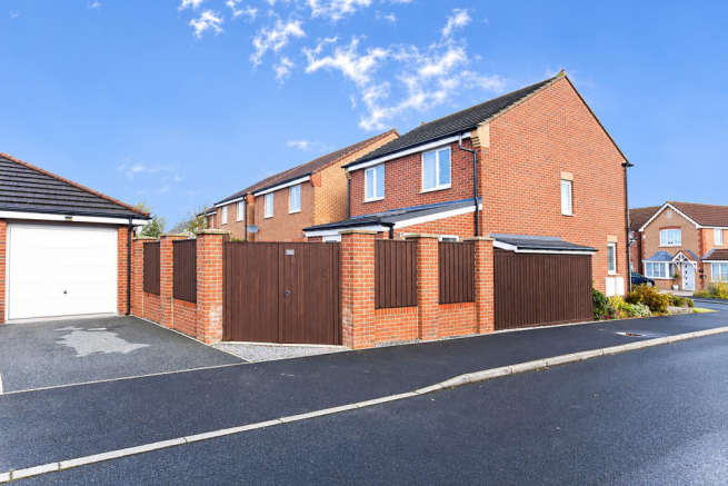 Modern Brick House with Timber Gate.png
