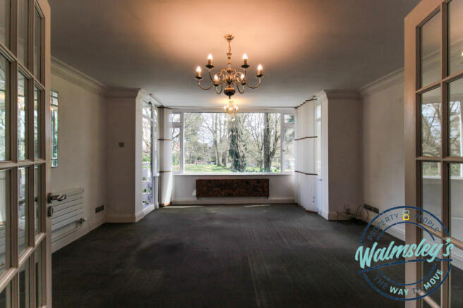 Sitting room with bay & balcony