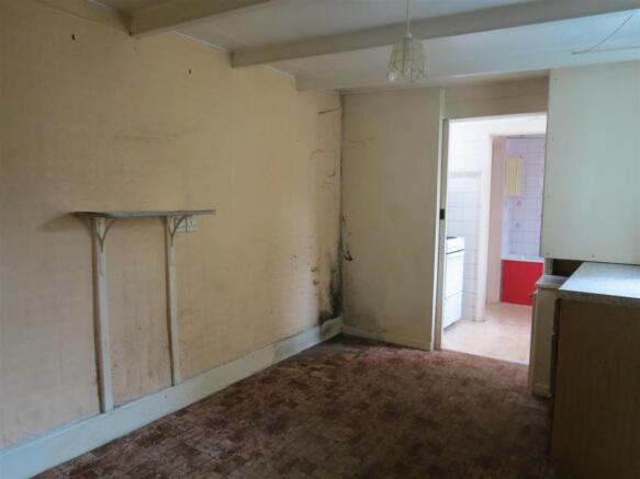 Former Kitchen Area/Dining