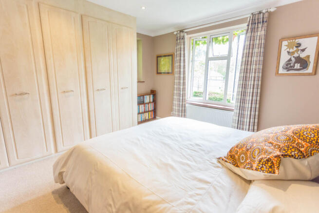 Bedroom 2 with wardrobes