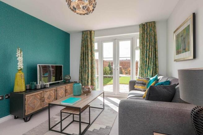 A separate living room with French doors to the rear garden