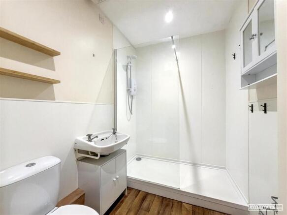 Modern bathroom with spacious walk-in shower...