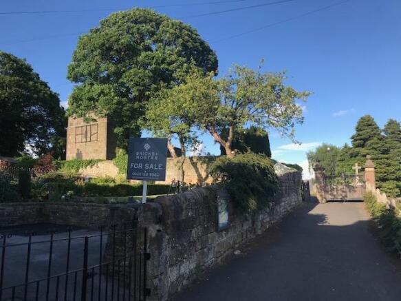 Path to church and our sign.jpg