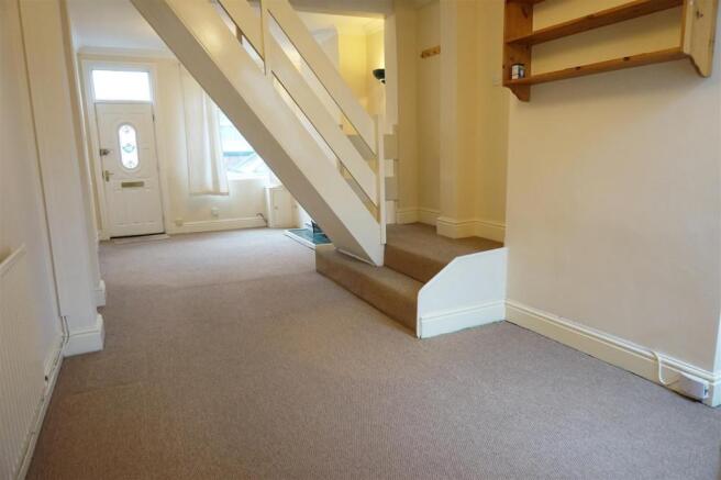THROUGH LOUNGE/DINING ROOM