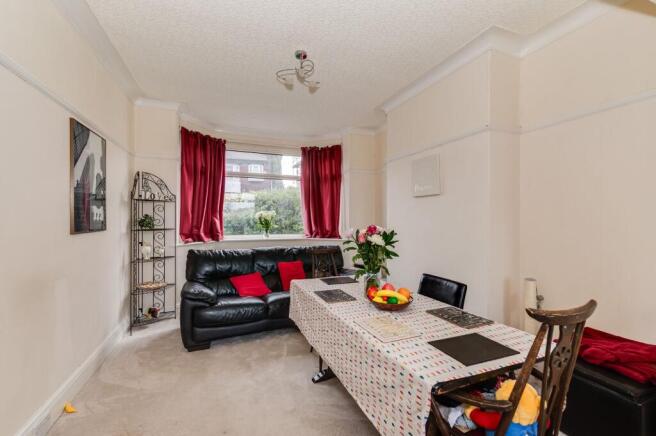 THROUGH SITTING/DINING ROOM AND KITCHEN