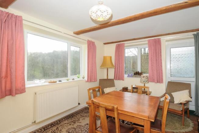 Separate dining room overlooking the garden